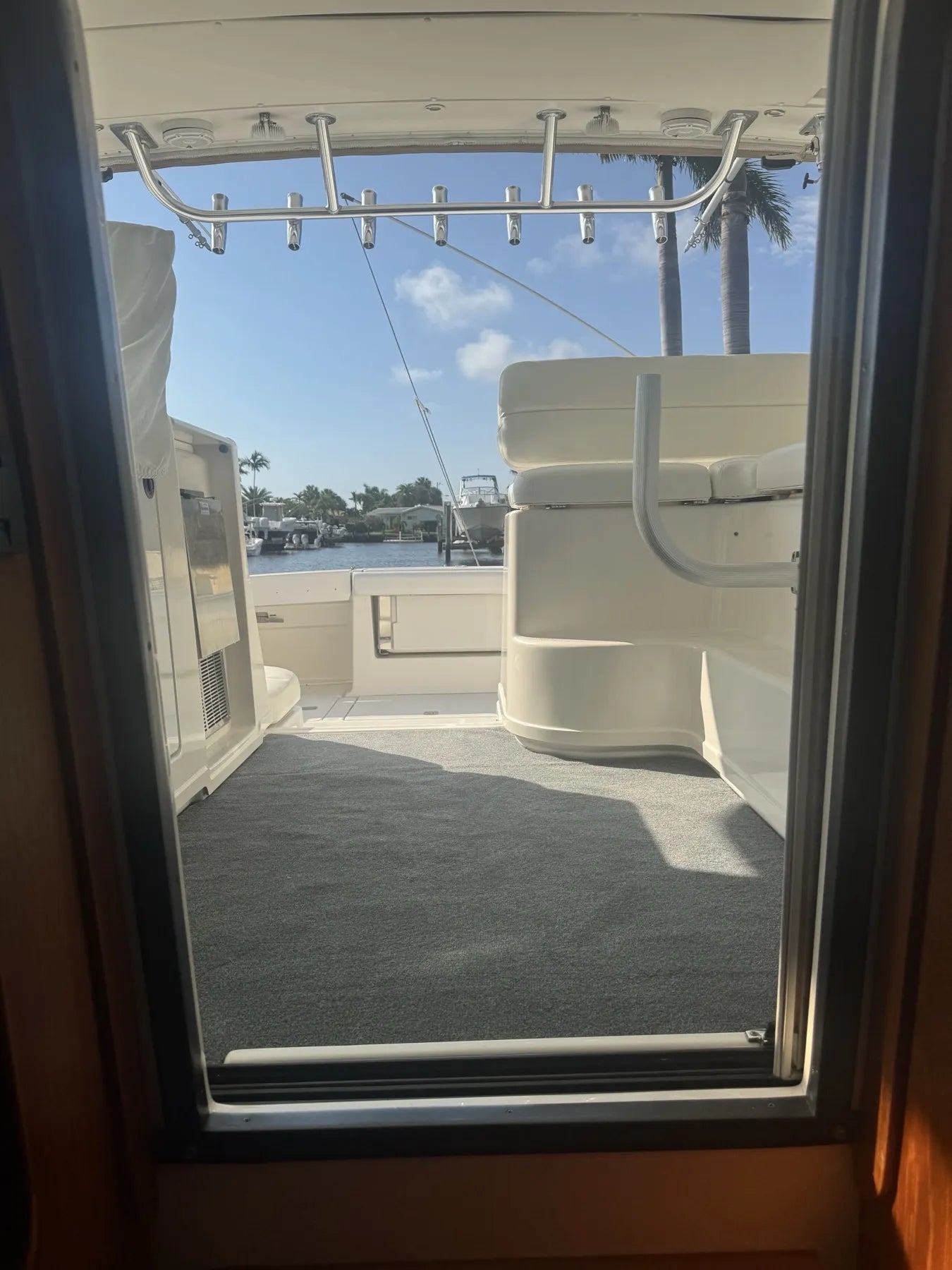 The cockpit seen from the cabin door, carpet cut to the threshold and around the seat bases
